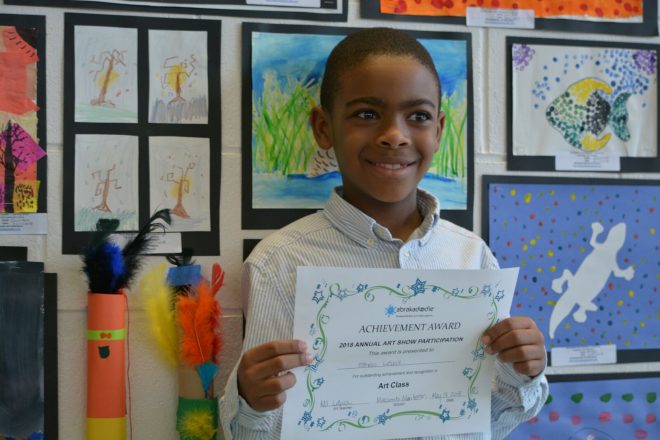 Boy with certificate